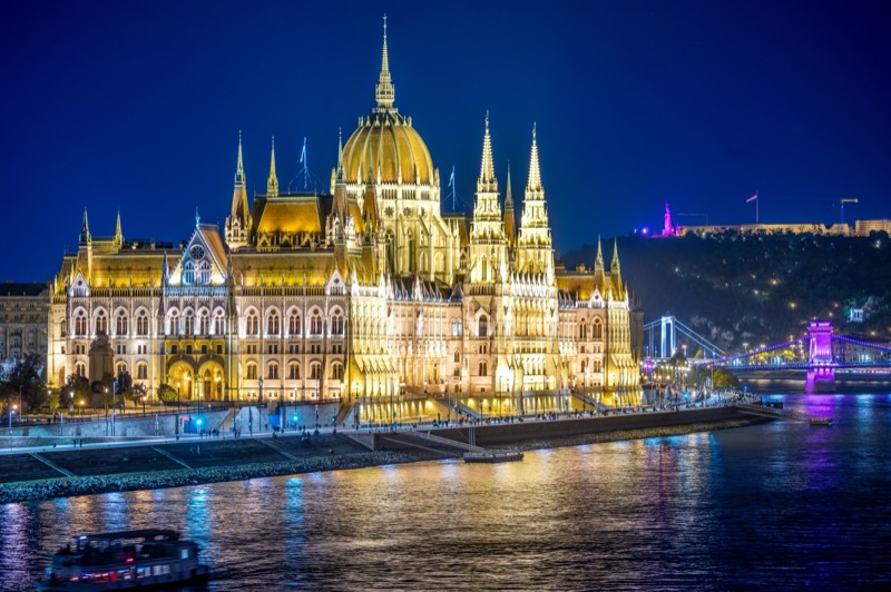 Budapest Parliament and the Danube panorama with night lighting